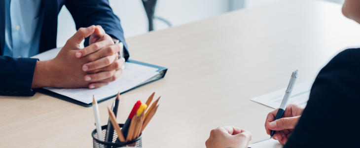 Woman interviewing potential employees